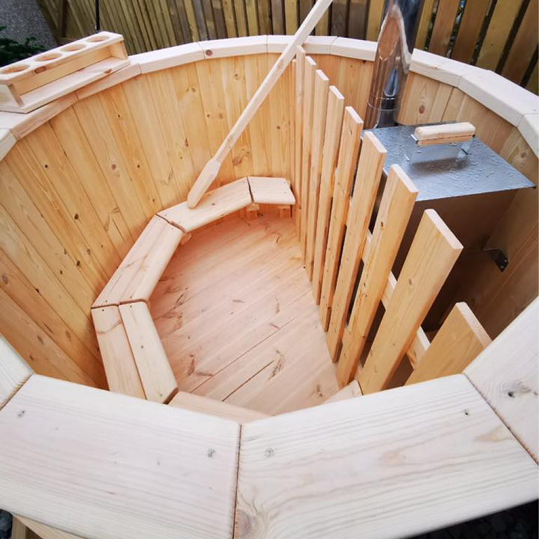Inside seats of a wooden hot tub installed by Synergy in Cumbria